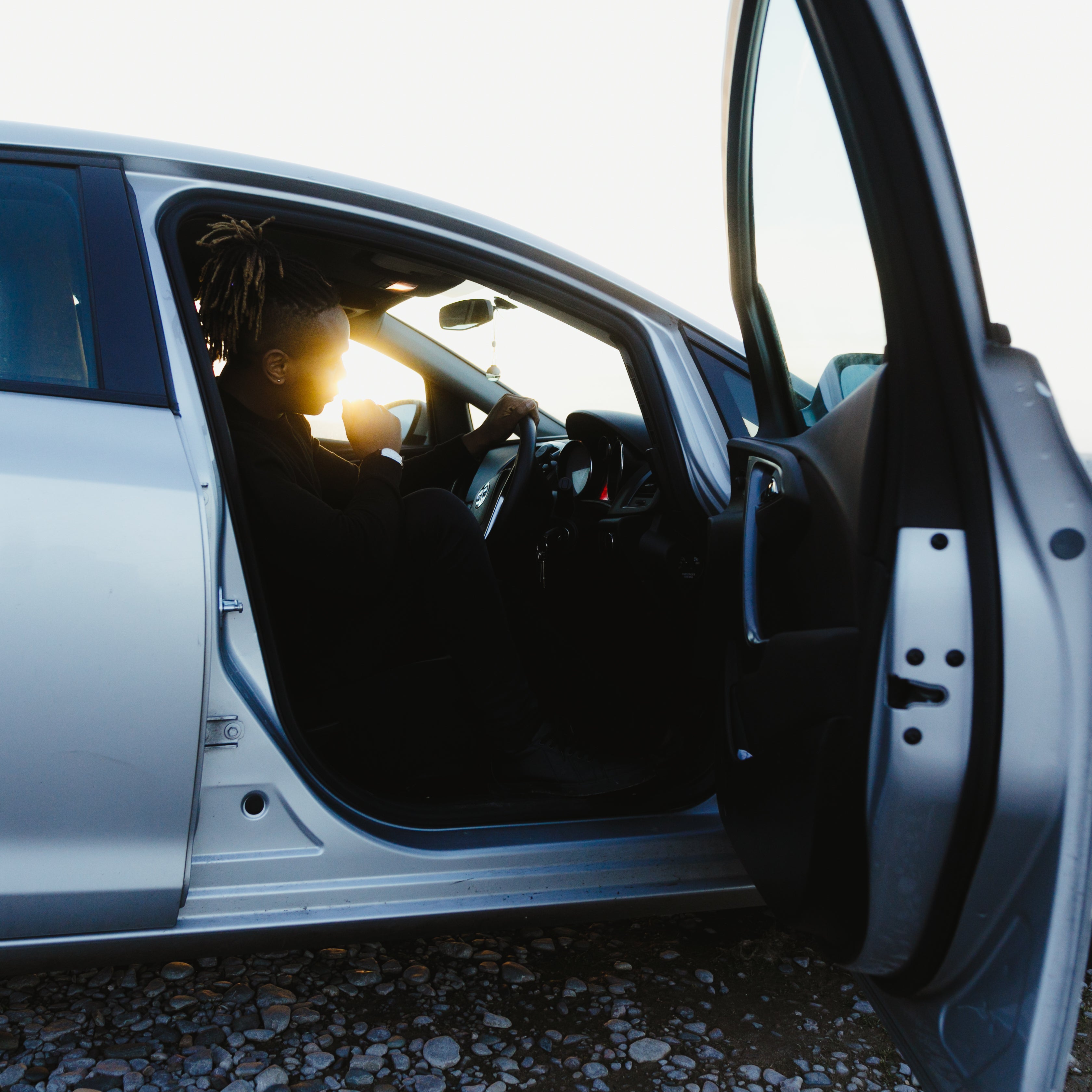 files/a-model-in-the-driving-seat-silhouetted-by-sunlight.jpg